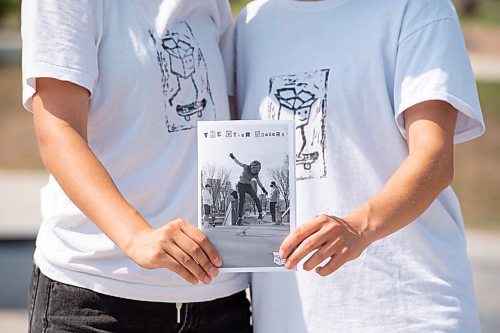 MIKE SUDOMA / WINNIPEG FREE PRESS
(Left to Right) Maddy Nowosad and Emilie Rafnson hold up copies of their zine The Other Skaters at Riverbend Skatepark Wednesday afternoon. 
July 7, 2021