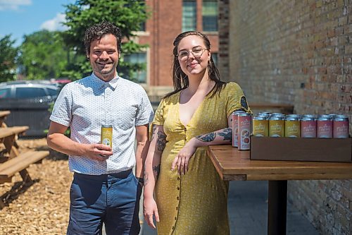 MIKAELA MACKENZIE / WINNIPEG FREE PRESS

Matthew Sabourin (with Nonsuch Brewing, left) and Callan Anderson (with Patent 5), collaborators on the new drink company called Nifty Drinks, pose for a photo with some artisanal hard seltzers in Winnipeg on Friday, July 9, 2021. For Ben Sigurdson story.
Winnipeg Free Press 2021.
