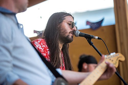 MIKAELA MACKENZIE / WINNIPEG FREE PRESS

Bobby Desjarlais sings as his band, Bullrider, plays to a packed house at Blue Note Park in Winnipeg on Friday, July 9, 2021. For Melissa Martin story.
Winnipeg Free Press 2021.