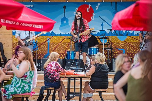 MIKAELA MACKENZIE / WINNIPEG FREE PRESS

Bobby Desjarlais sings as his band, Bullrider, plays to a packed house at Blue Note Park in Winnipeg on Friday, July 9, 2021. For Melissa Martin story.
Winnipeg Free Press 2021.