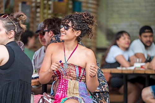 MIKAELA MACKENZIE / WINNIPEG FREE PRESS

Claire Boyd dances in her seat as Bullrider plays to a packed house at Blue Note Park in Winnipeg on Friday, July 9, 2021. For Melissa Martin story.
Winnipeg Free Press 2021.