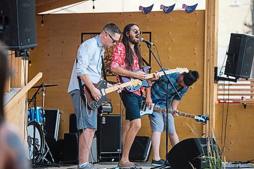 MIKAELA MACKENZIE / WINNIPEG FREE PRESS

Bullrider (Ben Ferguson, left, Bobby Desjarlais, and Chris Peluk) plays to a packed house at Blue Note Park in Winnipeg on Friday, July 9, 2021. For Melissa Martin story.
Winnipeg Free Press 2021.