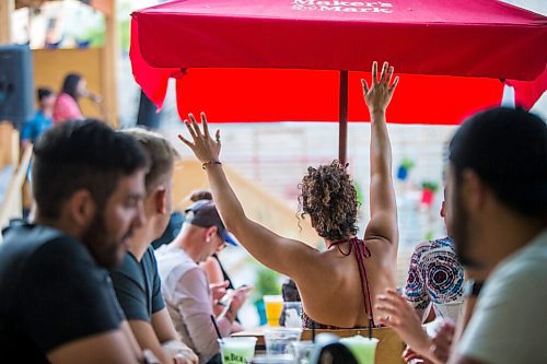 MIKAELA MACKENZIE / WINNIPEG FREE PRESS

Claire Boyd dances in her seat as Bullrider plays to a packed house at Blue Note Park in Winnipeg on Friday, July 9, 2021. For Melissa Martin story.
Winnipeg Free Press 2021.