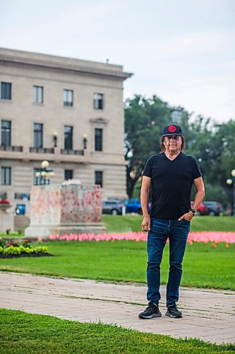 MIKAELA MACKENZIE / WINNIPEG FREE PRESS

Vince Fontaine, an Ojibway musician and lead singer of Eagle & Hawk and Indian City, poses for a portrait by the empty platform on the legislative grounds in Winnipeg on Monday, July 12, 2021. He is one of several local Indigenous artists sharing their thoughts on what should replace the toppled statue of Queen Victoria at the Manitoba Legislative Building. For Eva Wasney story.
Winnipeg Free Press 2021.