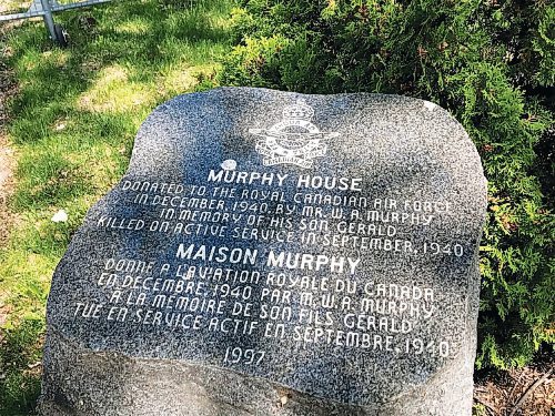 Canstar Community News This stone marker outside the Murphy House in River Heights explains how the home came to be donated to the Royal Canadian Air Force.