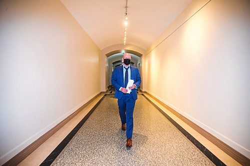 MIKAELA MACKENZIE / WINNIPEG FREE PRESS

Dr. Brent Roussin, chief provincial public health officer, walks in to give his daily COVID-19 update at the Manitoba Legislative Building in Winnipeg on Monday, July 12, 2021. For --- story.
Winnipeg Free Press 2021.