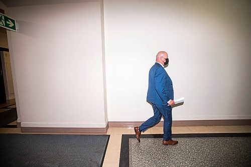 MIKAELA MACKENZIE / WINNIPEG FREE PRESS

Dr. Brent Roussin, chief provincial public health officer, walks in to give his daily COVID-19 update at the Manitoba Legislative Building in Winnipeg on Monday, July 12, 2021. For --- story.
Winnipeg Free Press 2021.