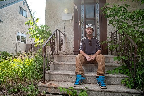 ALEX LUPUL / WINNIPEG FREE PRESS  

Matthew Cowap is photographed outside of his home in Winnipeg on Monday, July 12, 2021. Water at the house has been turned off for the last five years. Cowap received a $23,000 water bill in 2016, and he's been fighting it ever since, with no progress.