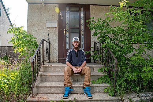 ALEX LUPUL / WINNIPEG FREE PRESS  

Matthew Cowap is photographed outside of his home in Winnipeg on Monday, July 12, 2021. Water at the house has been turned off for the last five years. Cowap received a $23,000 water bill in 2016, and he's been fighting it ever since, with no progress.