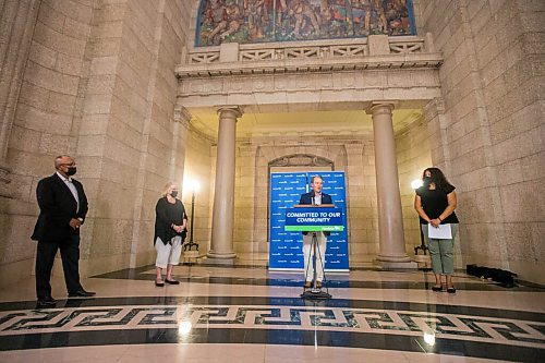 MIKAELA MACKENZIE / WINNIPEG FREE PRESS

Justice minister Cameron Friesen (centre) and Victims Assistance Community Grants Inc. board members Ron Evans (left), Wilma Derksen, and Cydney Bergen speak about new funding supports for victims of crime at an announcement at the Manitoba Legislative Building in Winnipeg on Tuesday, July 13, 2021. For Dylan Robertson story.
Winnipeg Free Press 2021.