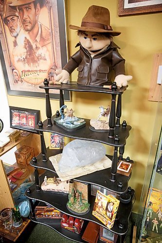 MIKE DEAL / WINNIPEG FREE PRESS
Many of the items in the collection are custom made, from diorama's to this muppet-like puppet of Indiana Jones. It was made by a fan of the movies who went to the Hansen school of puppetry.
Les David owner of the world's largest collection of Raiders of the Lost Ark and Indiana Jones memorabilia. Les is currently conducting an official count of his stuff, for entry into the Guinness Book of World Records.
Les and his wife moved to a farmstead about 15 years ago, expressly to have a place for his collection. It's kept in a self-contained, climate-controlled room built inside his barn.
210708 - Thursday, July 08, 2021.