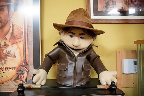 MIKE DEAL / WINNIPEG FREE PRESS
Many of the items in the collection are custom made, from diorama's to this muppet-like puppet of Indiana Jones. It was made by a fan of the movies who went to the Hansen school of puppetry.
Les David owner of the world's largest collection of Raiders of the Lost Ark and Indiana Jones memorabilia. Les is currently conducting an official count of his stuff, for entry into the Guinness Book of World Records.
Les and his wife moved to a farmstead about 15 years ago, expressly to have a place for his collection. It's kept in a self-contained, climate-controlled room built inside his barn.
210708 - Thursday, July 08, 2021.