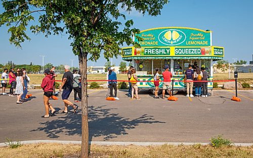 MIKE DEAL / WINNIPEG FREE PRESS
A line up for the lemonade stand at the Leila Supersite sprung up as people who got vaccinations were give a coupon for a free drink Wednesday morning.
All 10 vaccine supersites in the province will be offering walk-ins only today, with 8,000 doses of Pfizer earmarked for youth between 12 and 17 years old.
See Erik Pindera story
210714 - Wednesday, July 14, 2021.