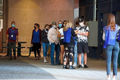 MIKE DEAL / WINNIPEG FREE PRESS
People without appointments waiting in line to get vaccinated Wednesday morning.
All 10 vaccine supersites in the province will be offering walk-ins only today, with 8,000 doses of Pfizer earmarked for youth between 12 and 17 years old.
See Erik Pindera story
210714 - Wednesday, July 14, 2021.