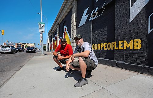 RUTH BONNEVILLE / WINNIPEG FREE PRESS

Standup Mural - Protect our People Ca

Peatr Thomas (red shirt) and Mike Valcourt, pose next to the mural they created on the south wall of Main Street Project, along Logan ave. at Main Street.  

Description: PROTECT OUR PEOPLE AND MAIN STREET PROJECT UNVEIL COMPLETED MURAL 
Winnipeg, MB, 

Story:  artists, influencers and community members  Protect our People Campaign to encourage indigenous people to get vaccinated. . As of the time of this media advisory, over 500 people experiencing homelessness receive vaccine through successful mobile outreach program.

July 14, 2021

