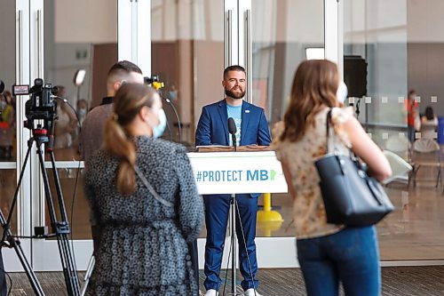 MIKE DEAL / WINNIPEG FREE PRESS
Dr. Joss Reimer, medical lead, Vaccine Implementation Task Force and Johanu Botha, operations, planning and logistics lead, Vaccine Implementation Task Force speak from the vaccine super site, RBC Convention Centre, 375 York Ave, providing the COVID-19 vaccine update during what the government is calling a vaccin-athon, Wednesday afternoon.
210714 - Wednesday, July 14, 2021.