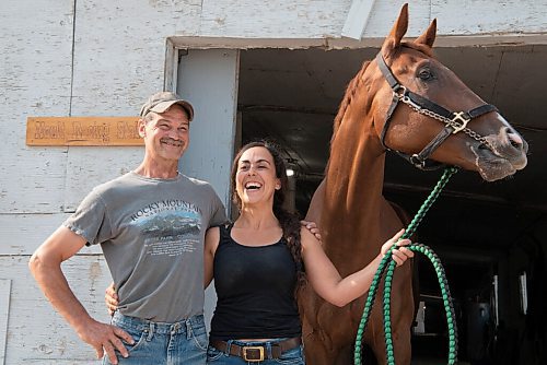 ALEX LUPUL / WINNIPEG FREE PRESS  

Trainer Mike Nault and assistant trainer Hanna Dilts are photographed with Flash of Glory, a local derby favourite, on Thursday, July 15, 2021.

Reporter: George Williams