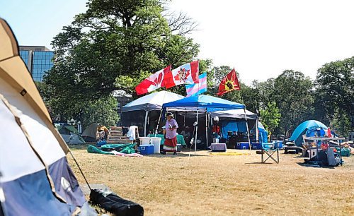 RUTH BONNEVILLE / WINNIPEG FREE PRESS

49.8 Leg camp 

Sacred fire healing village on the east side of the Legislative grounds.

Reporter: Ben Waldman 

July 13, 2021


