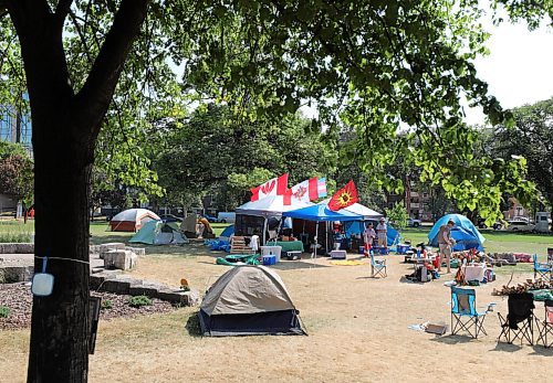 RUTH BONNEVILLE / WINNIPEG FREE PRESS

49.8 Leg camp 

Sacred fire healing village on the east side of the Legislative grounds.

Reporter: Ben Waldman 

July 13, 2021


