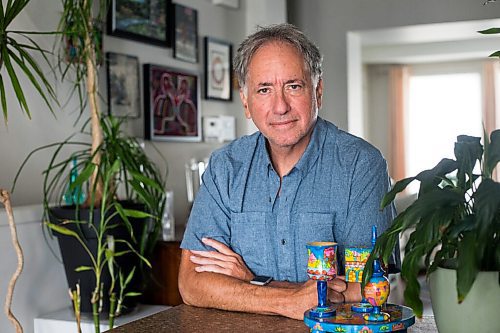 MIKAELA MACKENZIE / WINNIPEG FREE PRESS

Rabbi Allan Finkel, chair of Winnipeg Council of Rabbis, poses for a portrait in his home in Winnipeg on Thursday, July 15, 2021. Winnipeg's Jewish community is opposing a proposal to have all male circumcisions take place in medical offices. For Brenda Suderman story.
Winnipeg Free Press 2021.