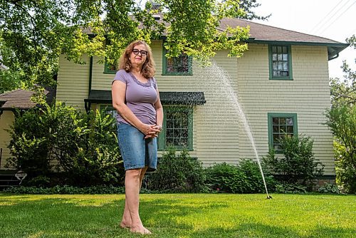 ALEX LUPUL / WINNIPEG FREE PRESS  

Robyn Rypp poses for a portrait in front of her Winnipeg home on Thursday, July 15, 2021. Rypp waters her lawn in River Heights twice a week, trying to keep it alive during heat and drought.

Reporter: Cody Sellar