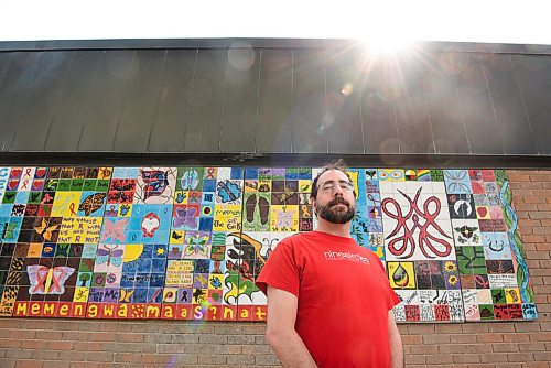 ALEX LUPUL / WINNIPEG FREE PRESS  

Mike Payne, executive director of Nine Circles Community Health Centre, poses for a portrait in front of a piece of artwork entitled Butterfly Patterns of Light on Friday, July 16, 2021.

Reporter: Melissa Martin