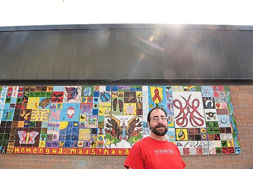 ALEX LUPUL / WINNIPEG FREE PRESS  

Mike Payne, executive director of Nine Circles Community Health Centre, poses for a portrait in front of a piece of artwork entitled Butterfly Patterns of Light on Friday, July 16, 2021.

Reporter: Melissa Martin