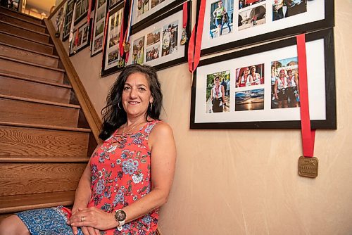 ALEX LUPUL / WINNIPEG FREE PRESS  

Corrine Norris, a nurse who has vaccinated more than 10,000 Manitobans against COVID-19 at the RBC Convention Centre, poses for a portrait at her home in Winnipeg on Friday, July 16, 2021.

Reporter: Danielle Da Silva