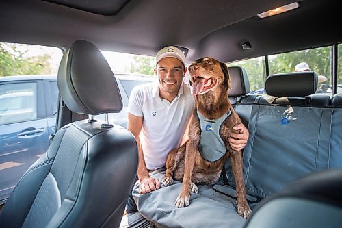 MIKAELA MACKENZIE / WINNIPEG FREE PRESS

Gordon Templeton and his dog, Nala, pose with the dog restraint and leash system that Templeton created in Winnipeg on Friday, July 16, 2021. For Dave Sanderson story.
Winnipeg Free Press 2021.