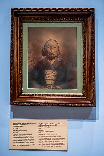 MIKAELA MACKENZIE / WINNIPEG FREE PRESS

A photo of Chief Gaagige-Binesi, one of the treaty negotiators, hangs above a display about Treaty One at the Manitoba Museum in Winnipeg on Tuesday, July 20, 2021. For --- story.
Winnipeg Free Press 2021.