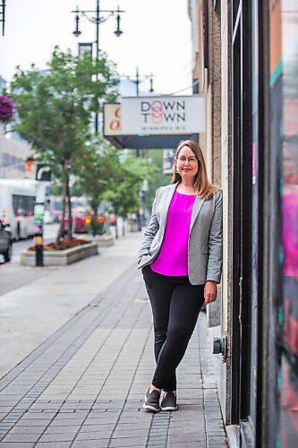 MIKAELA MACKENZIE / WINNIPEG FREE PRESS

Kate Fenske, executive director of the Downtown BIZ, poses for a portrait on Portage Avenue in Winnipeg on Tuesday, July 20, 2021. For Ben Waldman story.
Winnipeg Free Press 2021.