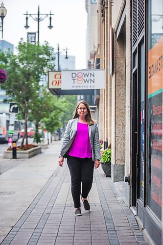 MIKAELA MACKENZIE / WINNIPEG FREE PRESS

Kate Fenske, executive director of the Downtown BIZ, poses for a portrait on Portage Avenue in Winnipeg on Tuesday, July 20, 2021. For Ben Waldman story.
Winnipeg Free Press 2021.