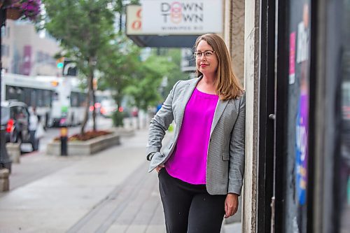 MIKAELA MACKENZIE / WINNIPEG FREE PRESS

Kate Fenske, executive director of the Downtown BIZ, poses for a portrait on Portage Avenue in Winnipeg on Tuesday, July 20, 2021. For Ben Waldman story.
Winnipeg Free Press 2021.