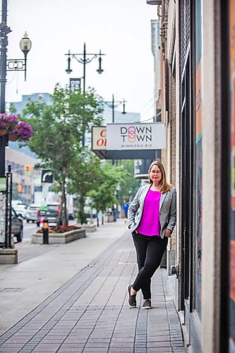 MIKAELA MACKENZIE / WINNIPEG FREE PRESS

Kate Fenske, executive director of the Downtown BIZ, poses for a portrait on Portage Avenue in Winnipeg on Tuesday, July 20, 2021. For Ben Waldman story.
Winnipeg Free Press 2021.