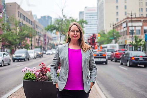 MIKAELA MACKENZIE / WINNIPEG FREE PRESS

Kate Fenske, executive director of the Downtown BIZ, poses for a portrait on Portage Avenue in Winnipeg on Tuesday, July 20, 2021. For Ben Waldman story.
Winnipeg Free Press 2021.