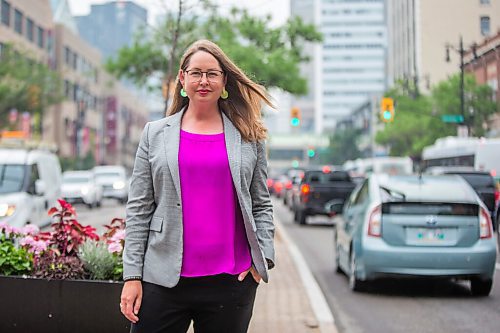 MIKAELA MACKENZIE / WINNIPEG FREE PRESS

Kate Fenske, executive director of the Downtown BIZ, poses for a portrait on Portage Avenue in Winnipeg on Tuesday, July 20, 2021. For Ben Waldman story.
Winnipeg Free Press 2021.