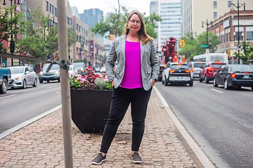 MIKAELA MACKENZIE / WINNIPEG FREE PRESS

Kate Fenske, executive director of the Downtown BIZ, poses for a portrait on Portage Avenue in Winnipeg on Tuesday, July 20, 2021. For Ben Waldman story.
Winnipeg Free Press 2021.