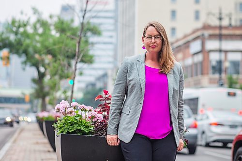 MIKAELA MACKENZIE / WINNIPEG FREE PRESS

Kate Fenske, executive director of the Downtown BIZ, poses for a portrait on Portage Avenue in Winnipeg on Tuesday, July 20, 2021. For Ben Waldman story.
Winnipeg Free Press 2021.