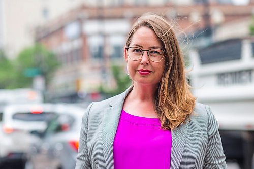 MIKAELA MACKENZIE / WINNIPEG FREE PRESS

Kate Fenske, executive director of the Downtown BIZ, poses for a portrait on Portage Avenue in Winnipeg on Tuesday, July 20, 2021. For Ben Waldman story.
Winnipeg Free Press 2021.