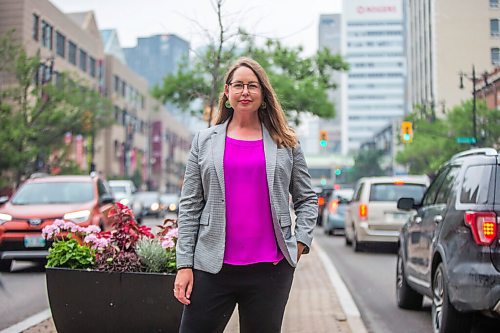 MIKAELA MACKENZIE / WINNIPEG FREE PRESS

Kate Fenske, executive director of the Downtown BIZ, poses for a portrait on Portage Avenue in Winnipeg on Tuesday, July 20, 2021. For Ben Waldman story.
Winnipeg Free Press 2021.