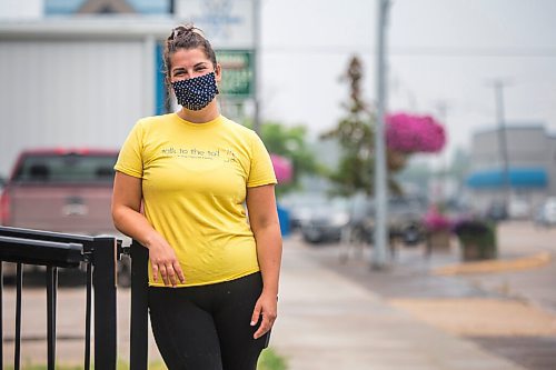 MIKAELA MACKENZIE / WINNIPEG FREE PRESS

Sara Matwychuk, owner of Talk to the Tail dog daycare in Niverville, poses for a portrait in front of her business on Wednesday, July 21, 2021. For Cody story.
Winnipeg Free Press 2021.