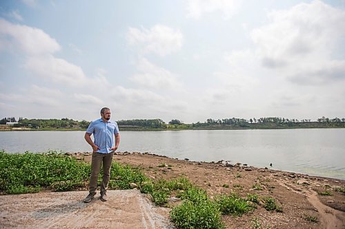 MIKAELA MACKENZIE / WINNIPEG FREE PRESS

Mayor Brandon Burley poses for a portrait at the end of the boat launch at Lake Minnewasta, where the town of Morden gets its water, on Thursday, July 22, 2021. For Kevin Rollason story.
Winnipeg Free Press 2021.