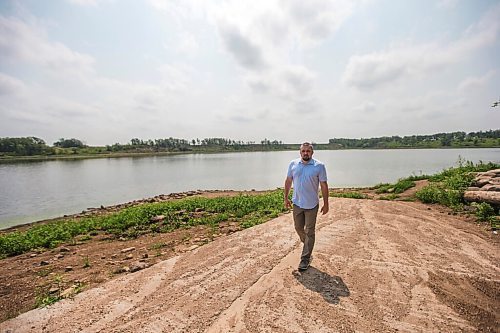 MIKAELA MACKENZIE / WINNIPEG FREE PRESS

Mayor Brandon Burley poses for a portrait at the end of the boat launch at Lake Minnewasta, where the town of Morden gets its water, on Thursday, July 22, 2021. For Kevin Rollason story.
Winnipeg Free Press 2021.