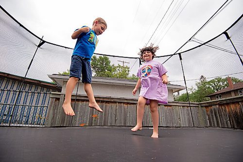 MIKE SUDOMA / Winnipeg Free Press
Sunshine fund recipients, Ethan Aviv Lakya, 6, (left) and his sister, Alma Aviv Lakya, 8, (right) share a moment as they jump on their backyard trampoline together Thursday afternoon
July 22, 2021