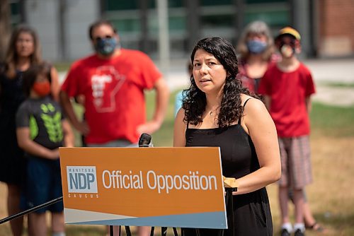 ALEX LUPUL / WINNIPEG FREE PRESS  

Amalia Zurzolo, a mother of two whose children attend Laura Secord, speaks during a press conference outside of Churchill High School in Winnipeg on Thursday, July 22, 2021. Kinew and local parents spoke about the need to improve ventilation in schools before classes resume in the fall.