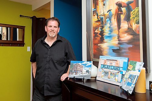 MIKE SUDOMA / Winnipeg Free Press
Artist, Ken Hodgert, shows of a few of his displayed in his apartment Thursday.
July 22, 2021