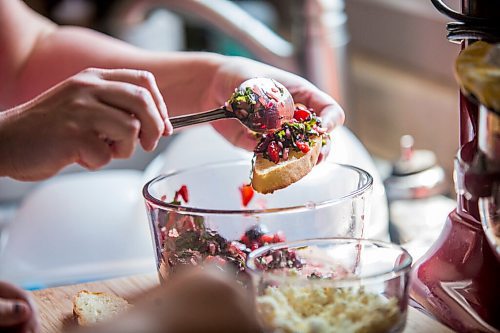 MIKAELA MACKENZIE / WINNIPEG FREE PRESS

Céline Land and her son, Félix (nine), make a summer bruschetta with Vegan Fromagerie feta at home in Winnipeg on Friday, July 23, 2021. For Eva Wasney story.
Winnipeg Free Press 2021.