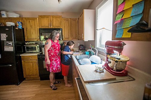 MIKAELA MACKENZIE / WINNIPEG FREE PRESS

Céline Land and her son, Félix (nine), make a summer bruschetta with Vegan Fromagerie feta at home in Winnipeg on Friday, July 23, 2021. For Eva Wasney story.
Winnipeg Free Press 2021.