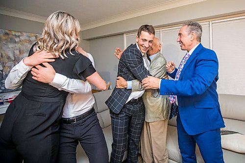 MIKAELA MACKENZIE / WINNIPEG FREE PRESS
Simone (left), Johnny, Carson, John, and Steve Lambos celebrate Carson's draft pick in their home in Winnipeg on Friday, July 23, 2021. For Mike story.
Winnipeg Free Press 2021.