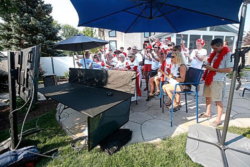 JOHN WOODS / WINNIPEG FREE PRESS
Family and friends of Canadian Triathlete Tyler Mislawchuck gather at his parents (centre) house in Oak Bluff to watch him race at the Tokyo Olympics Sunday, July 25, 2021. 

Reporter: Sawatzky